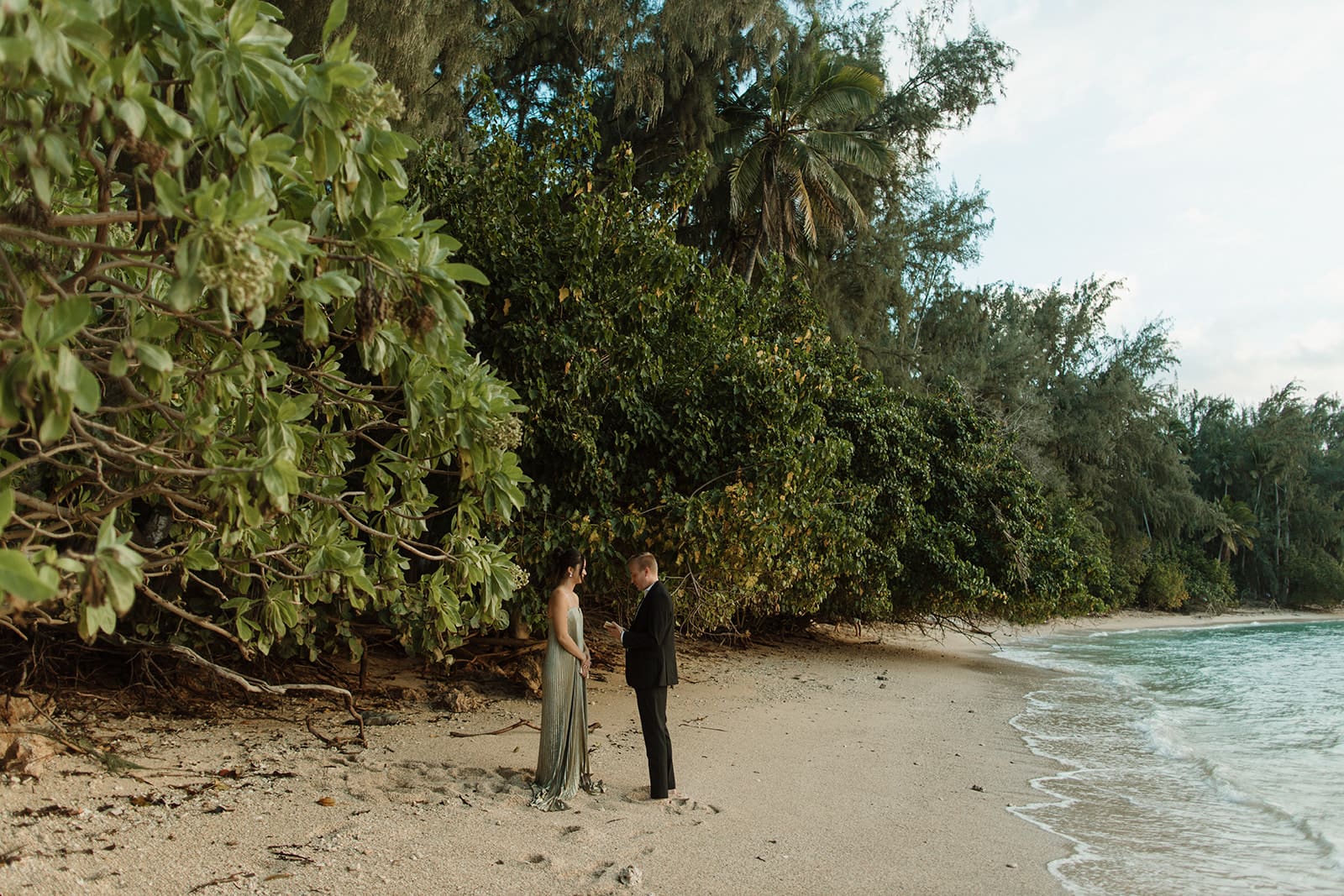 Beach vow renewal on Kauai shot by photographer Julia Kathleen