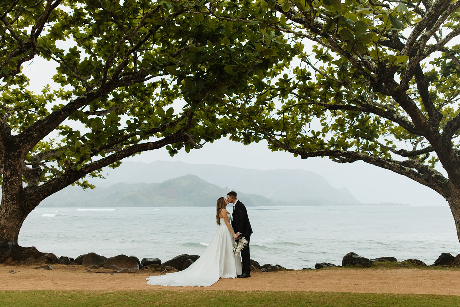 Kauai beach wedding ceremony shot by wedding photographer Julia Kathleen